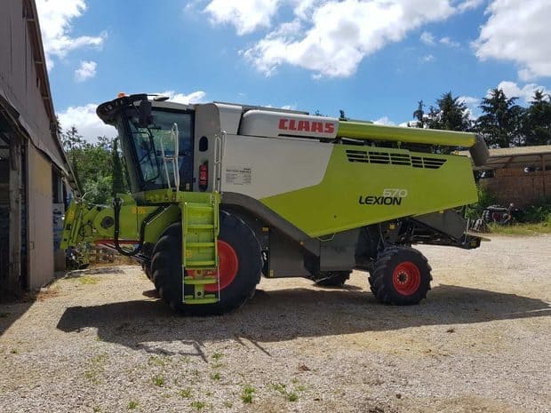 moissonneuse batteuse en intercuma Claas Lexion 670